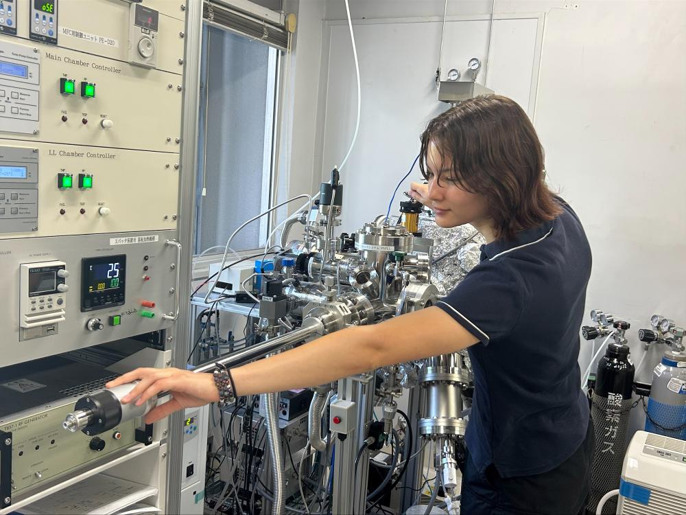 Student conducts research in lab in Japan