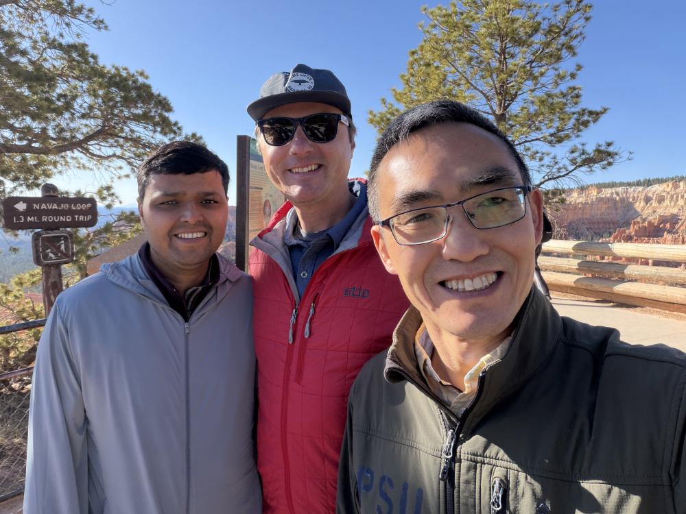 Ravindra Tripath, Derrick Taff and Bing Pan in a selfie taken by Pan at a trailhead at Bryce Canyon National Park.