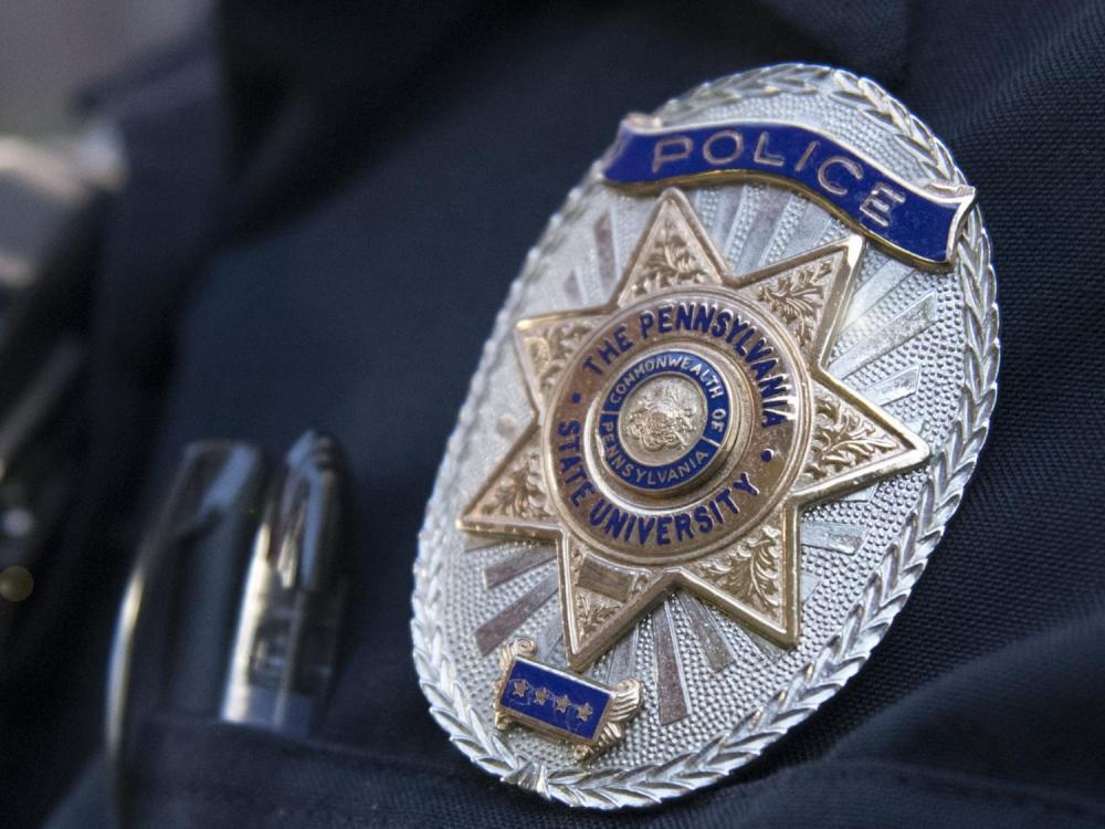 University Police badge on chest of officer