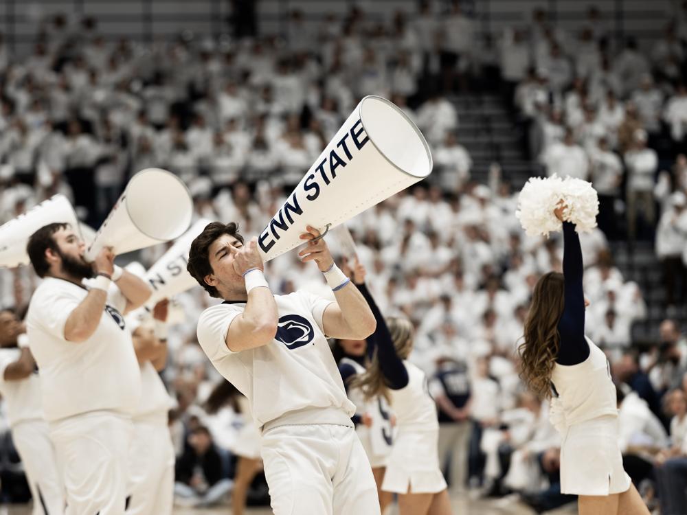 Penn State Cheerleader getting the crowd pumped up with a megaphone