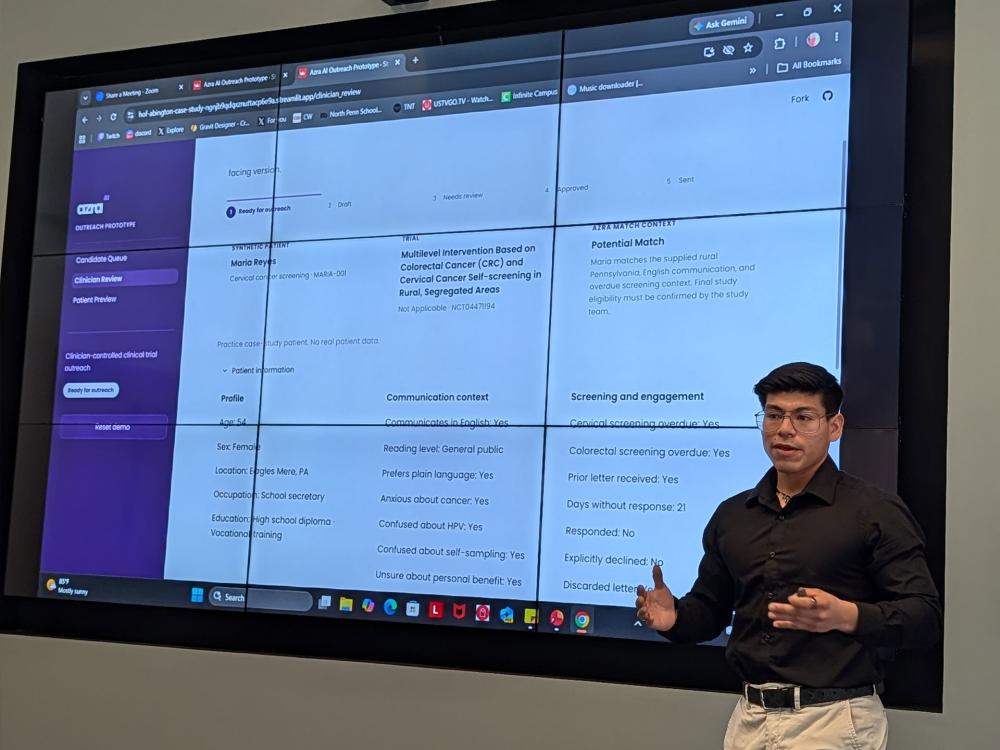 man standing in front of monitor