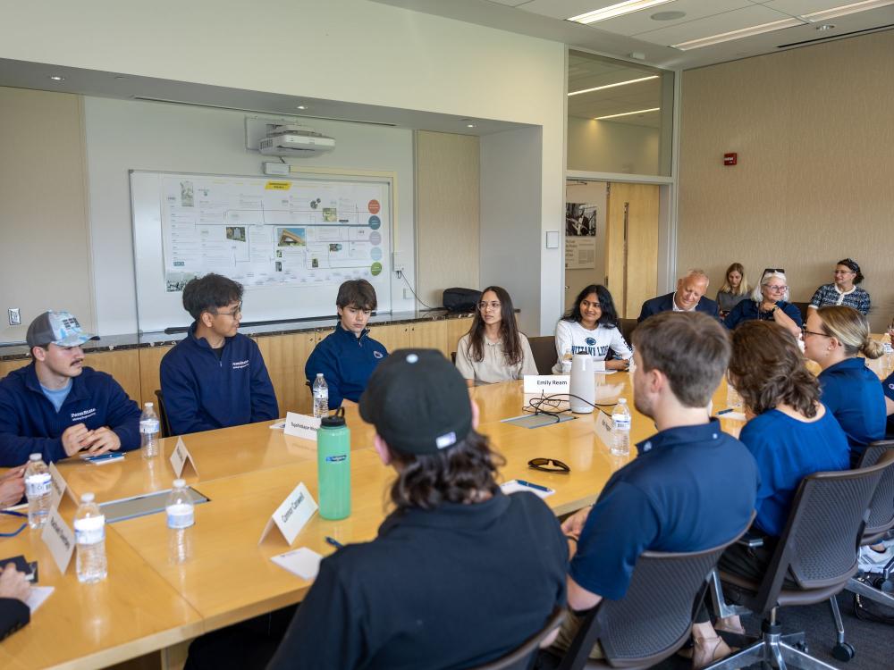 People sitting around a conference table