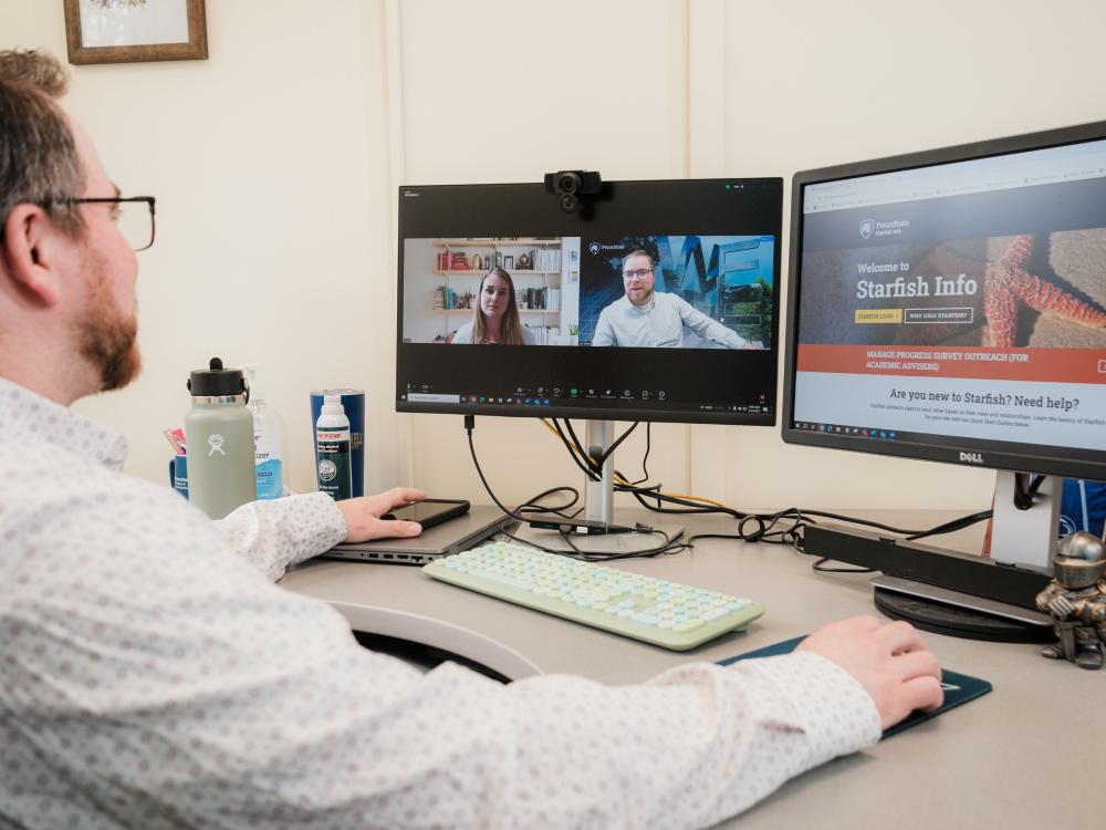 Academic Adviser on Zoom call talking with student