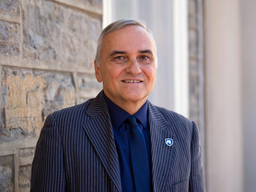 A headshot image of Penn State faculty member Frantisek Marko outside of Old Main.