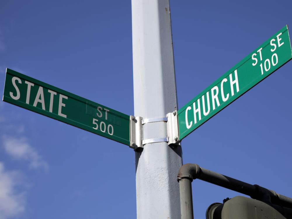 Road signs at the intersection of State and Church Streets