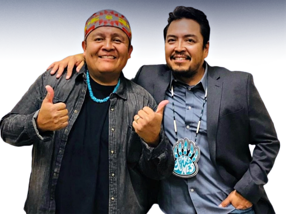 Two smiling Indigenous people