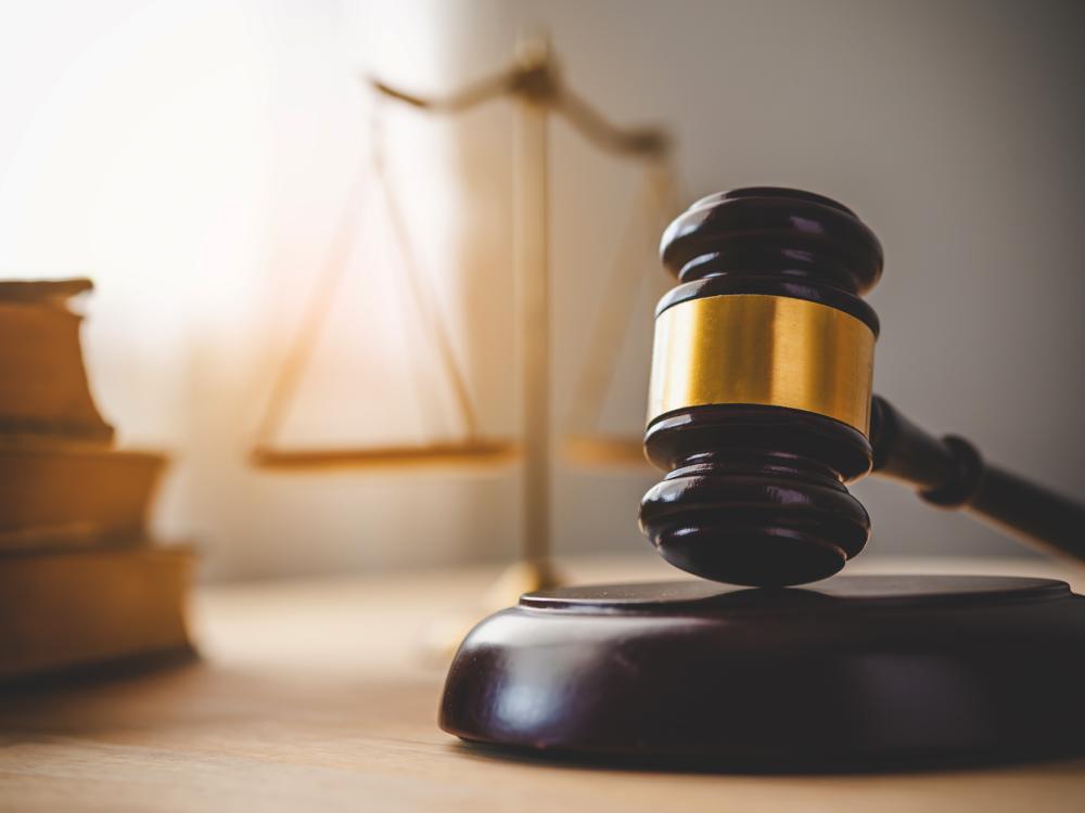 A gavel, books, scales