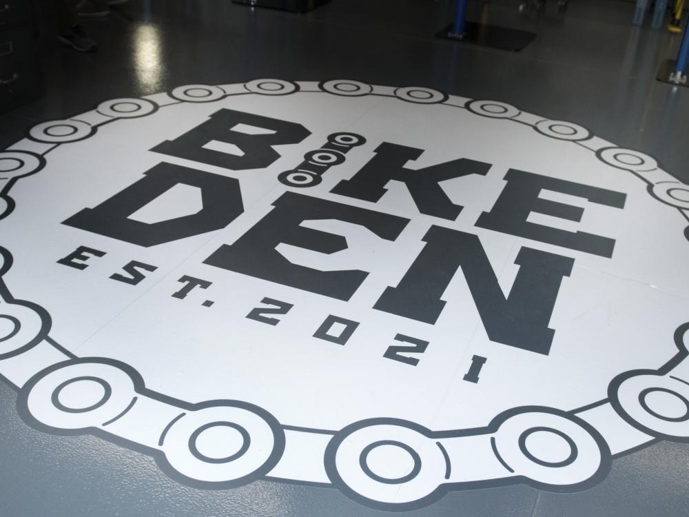 Bike Den floor sign