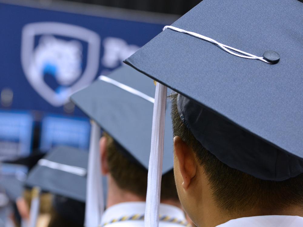 Student in Graduation Cap 