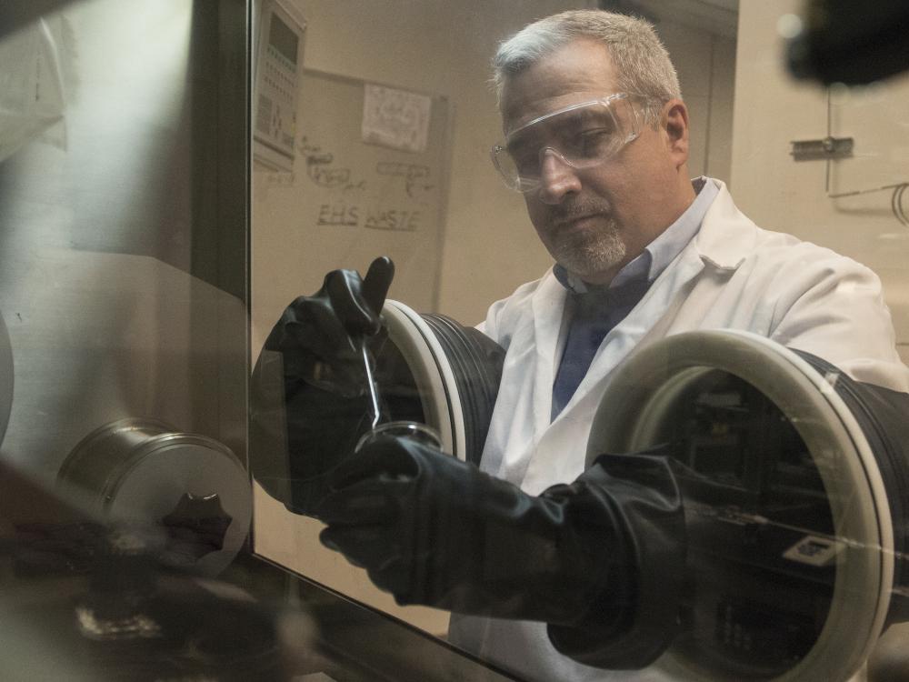 Mauricio Terrones working with glove box