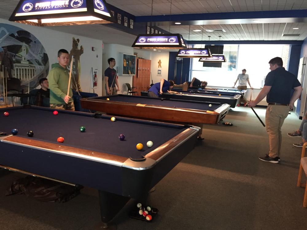 Students playing pool