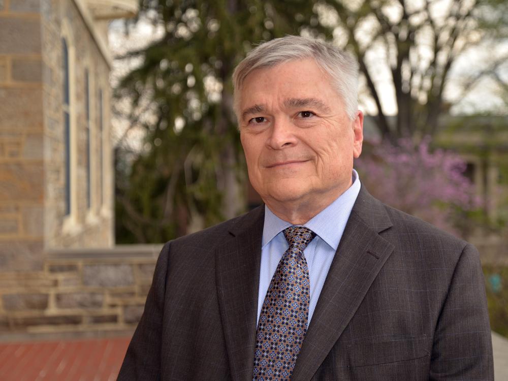 Portrait of Penn State President Eric Barron in front of Old Main on April 22, 2016.