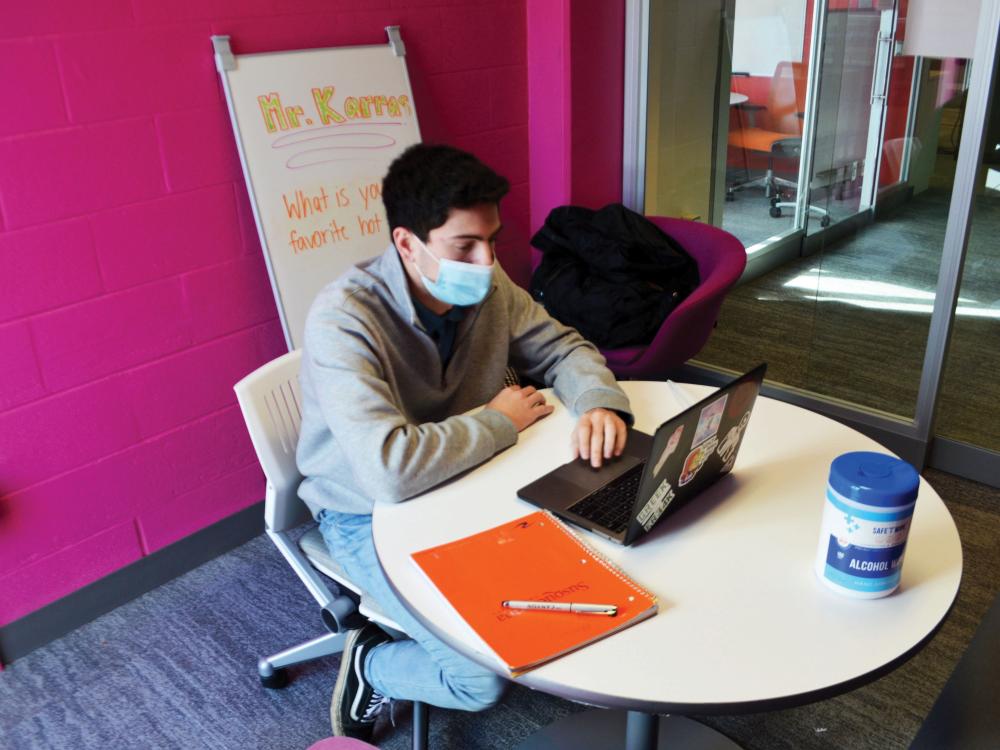 Student teacher Alex Karras conducts a classroom session at Mount Nittany Middle School from his Krause Studio office inside Chambers Building.