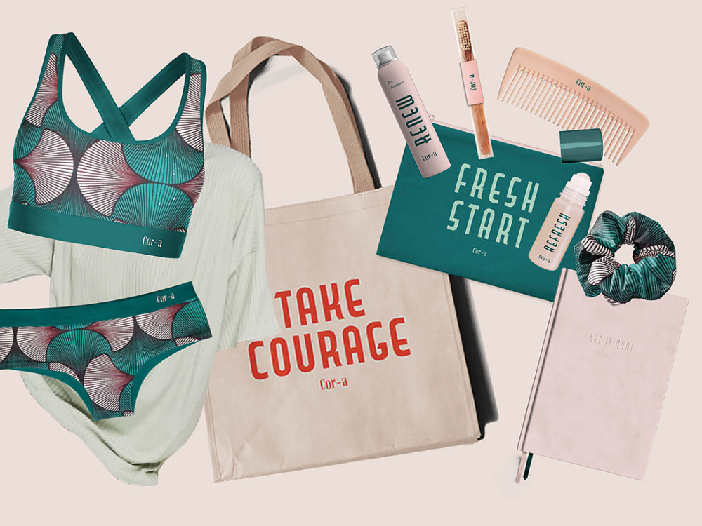 Items in a Cor-a care package including a swimsuit, a carrying bag, a hair scrunchie, a toiletry bag, and more.