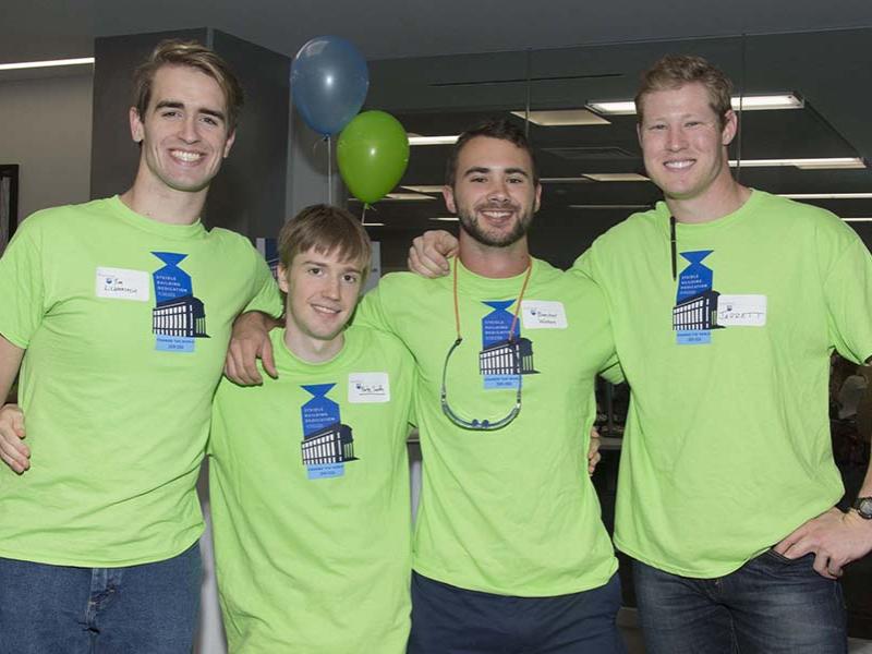 Student helpers Tim Lichtenstein, left, Nate Smith, Beecher Watson and Jarrett Rice attend the Steidle dedication.