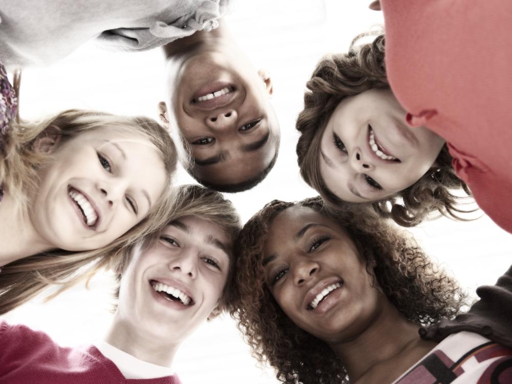 Five Teenage Friends Looking Down Into Camera