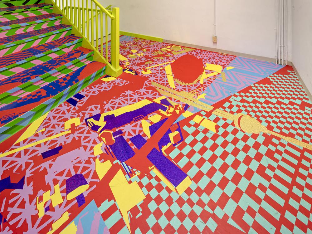 A brightly-colored art installation in a stairwell