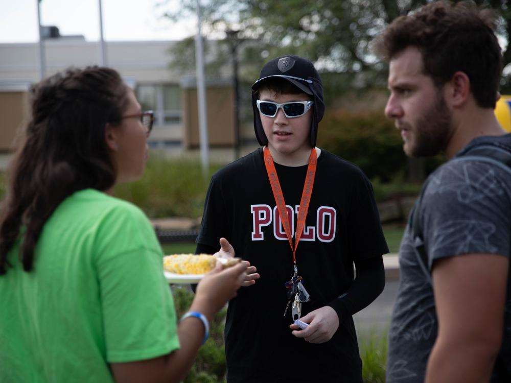 Mackinly Adams speaks with students