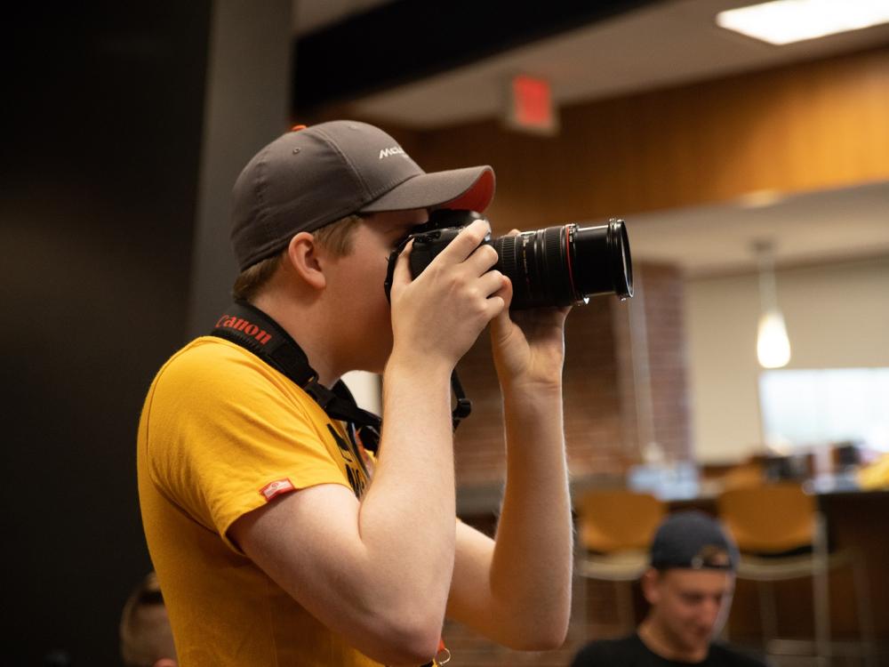 Mackinly Adams taking photographs 