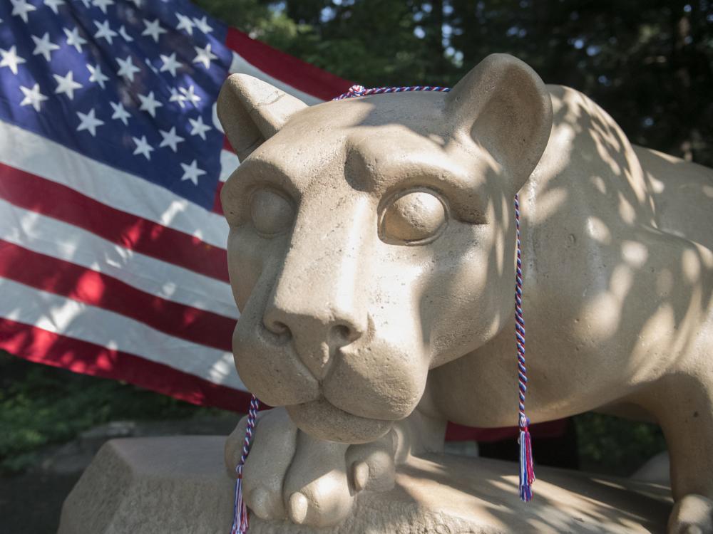 Lion shrine with flag