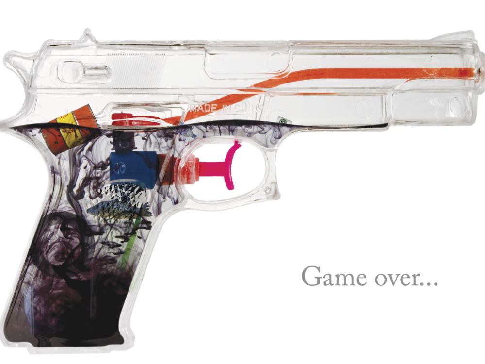 Poster design blending environmental images, a gun, and words 'Game Over'