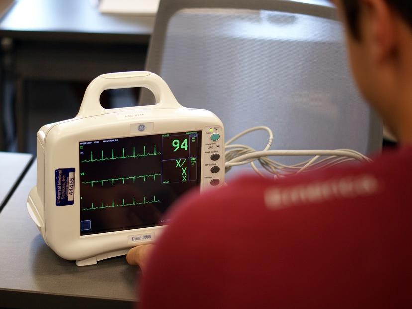 Student viewing patient monitor