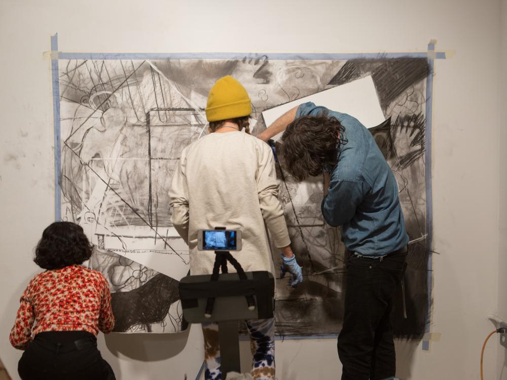 Three participants take part in a workshop in New York.
