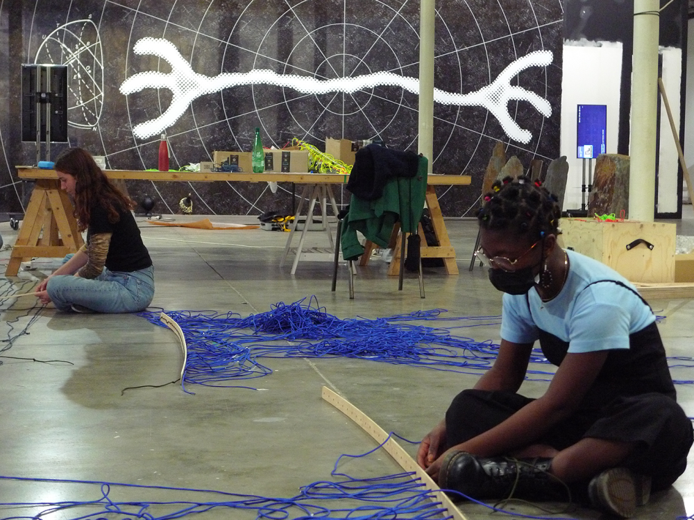 Students from Ecole des Beaux-arts de Nantes St. Nazaire installing the Fufuzela exhibit 