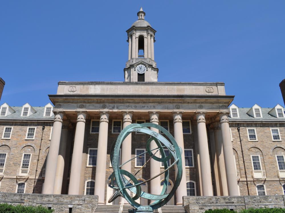 Photo of the front of Old Main at University Park