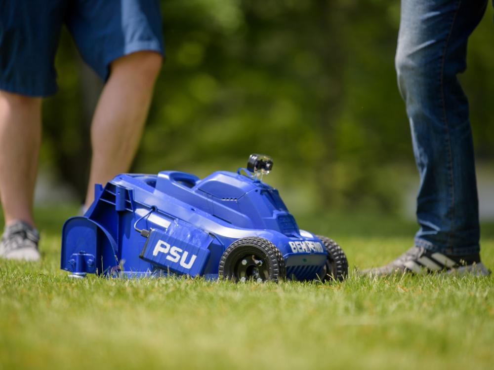 A close-up of a remote-control lawn mower built by students at Penn State Behrend.