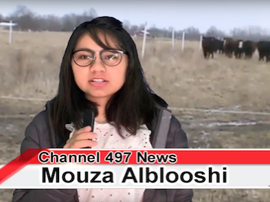 Student greenscreened over a pasture scene pretending to be a news reporter