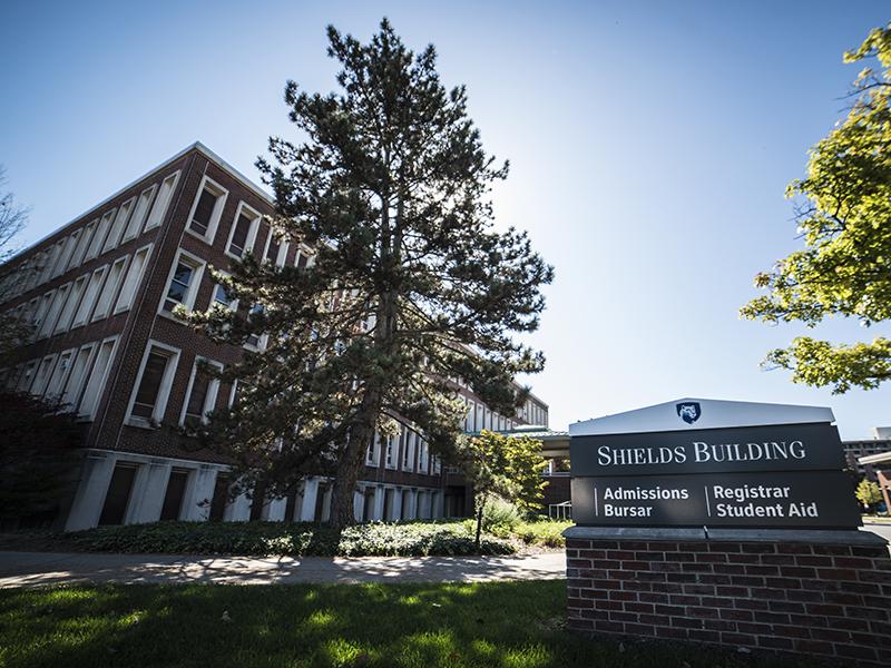 Exterior photo of the Shields Building in the summer