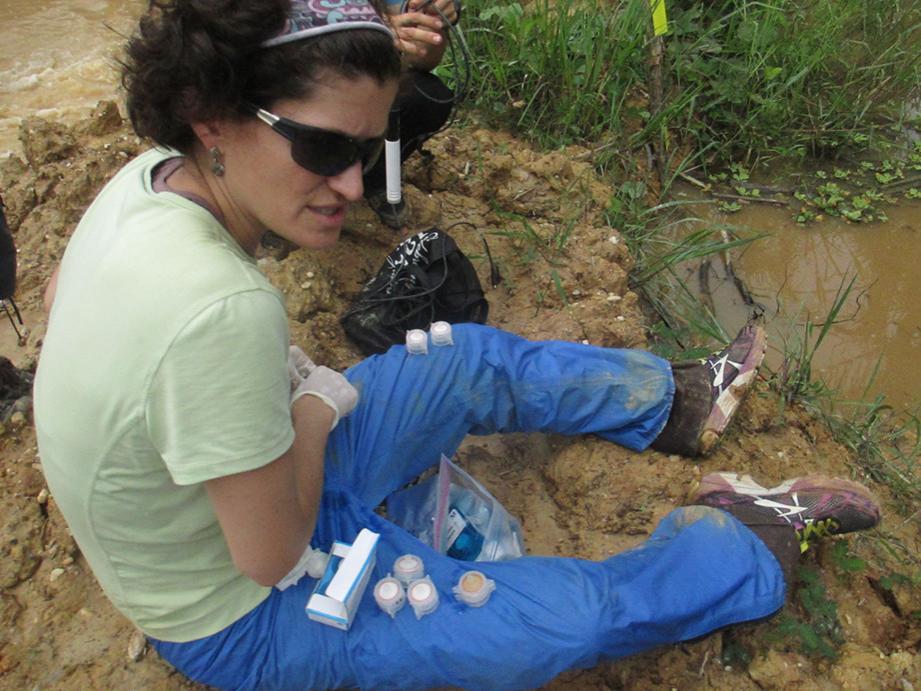Erica Smithwick collecting water samples