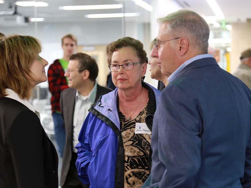 Susan Sinnott, head of the Materials Science and Engineering Department, left, talks with Jane and John Coppola.