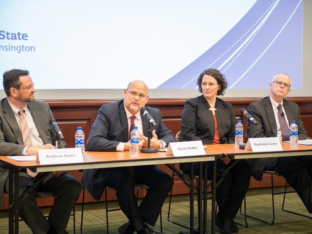 Panelists discuss Penn State's strategic plan at the town hall.