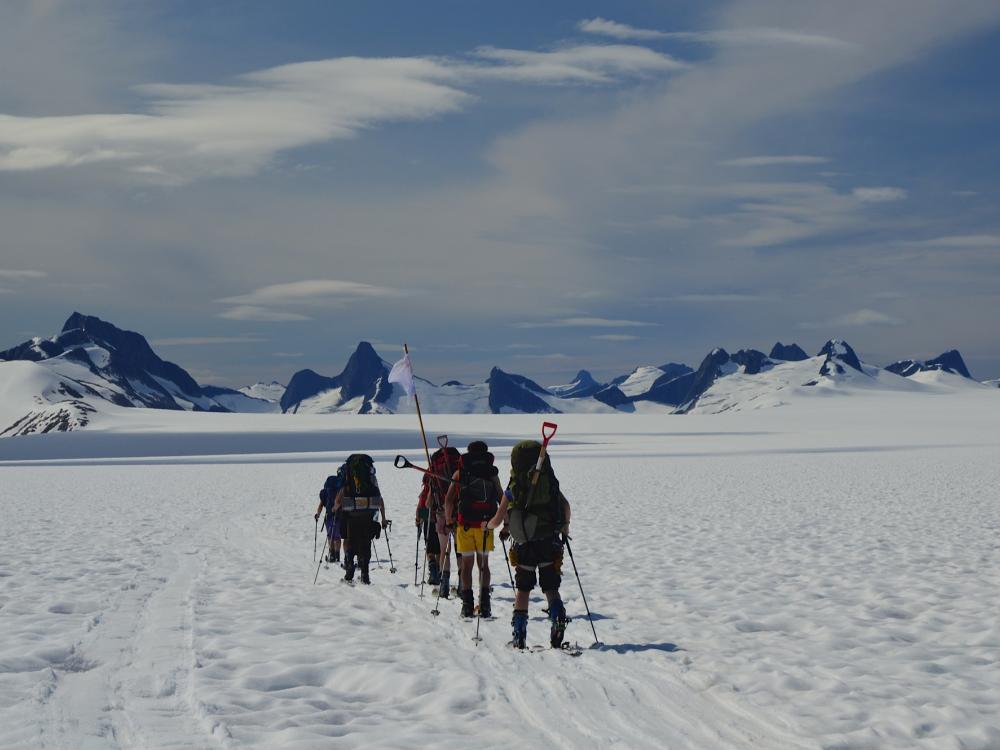 Students skiing to class