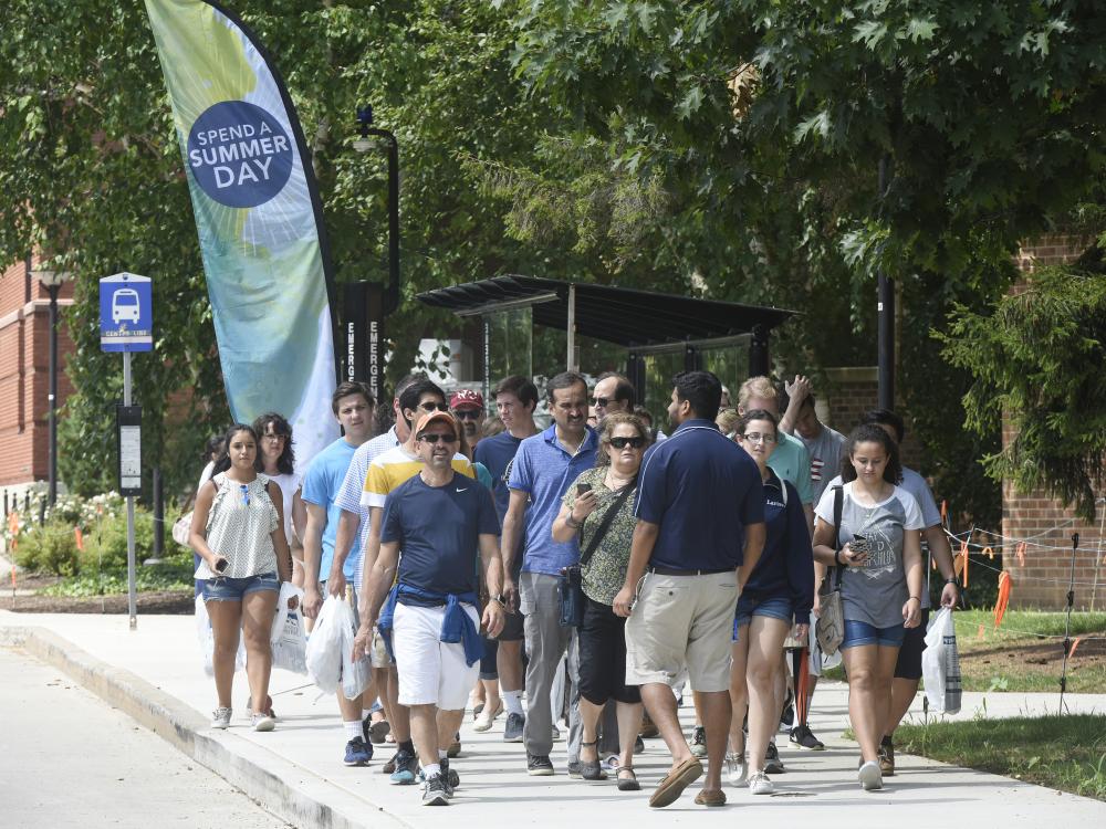 A guide gives a tour at the University Park campus