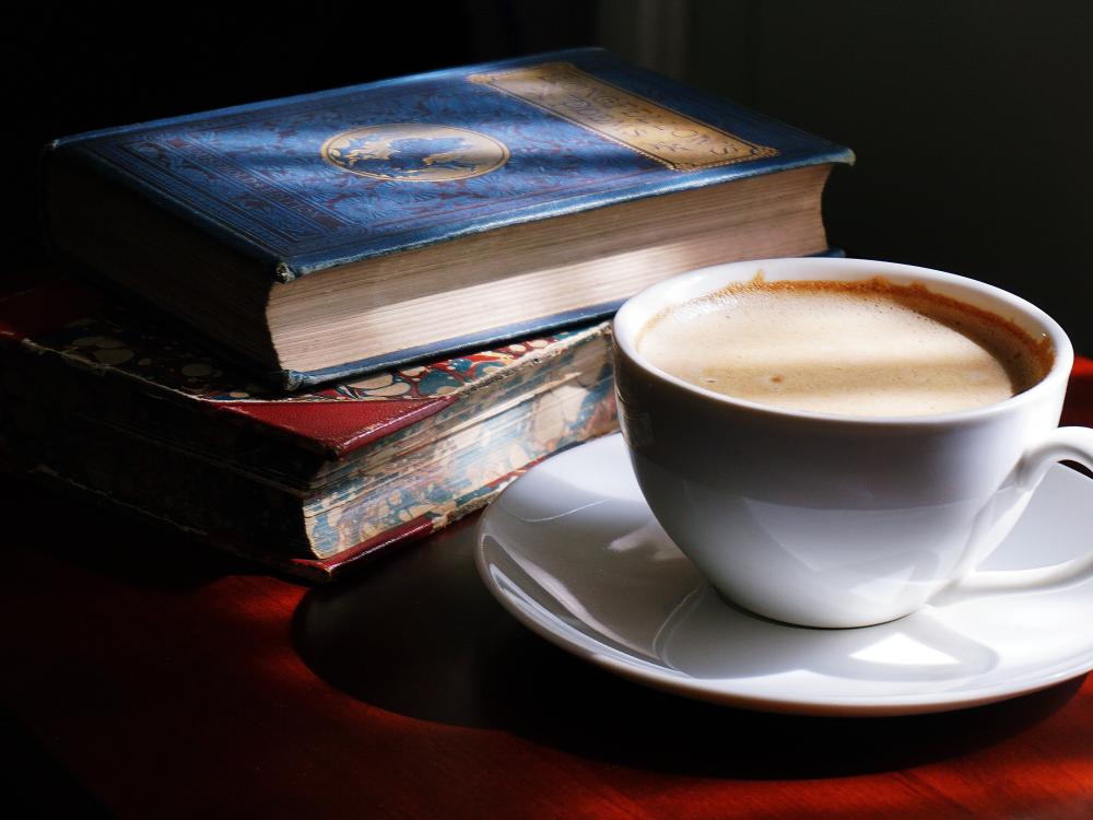 Books, coffee cup, research photo