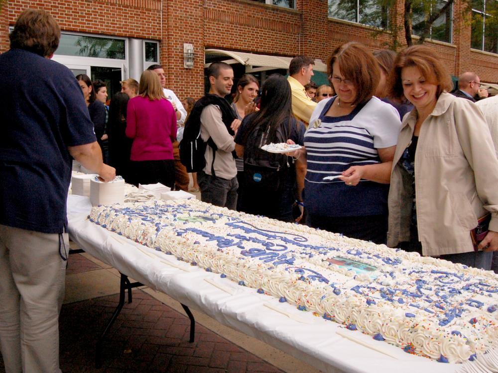 Cake being served at the HUB expansion groundbreaking