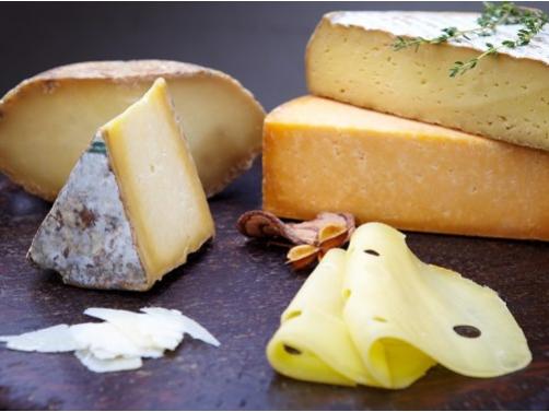 cheeses on display