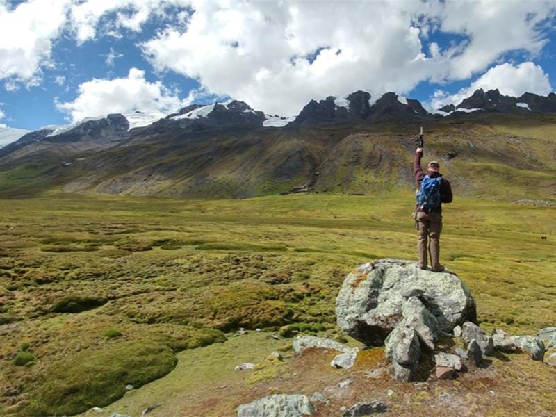 Colin Kelly setting up to take a 360-degree photo at the Paco Pampa bofedales system in Peru