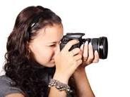 girl holding a camera 