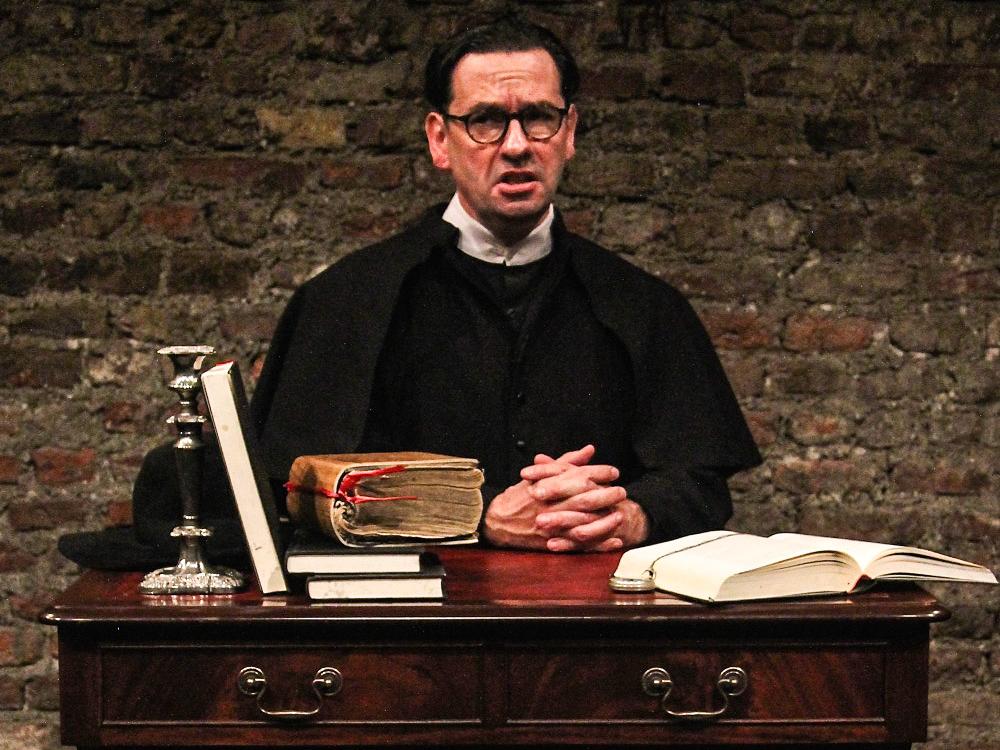 Donal Courtney as Monsignor Hugh O’Flaherty, an Irish priest, while in Rome during World War II