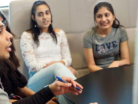 students participate in a diversity circle group discussion