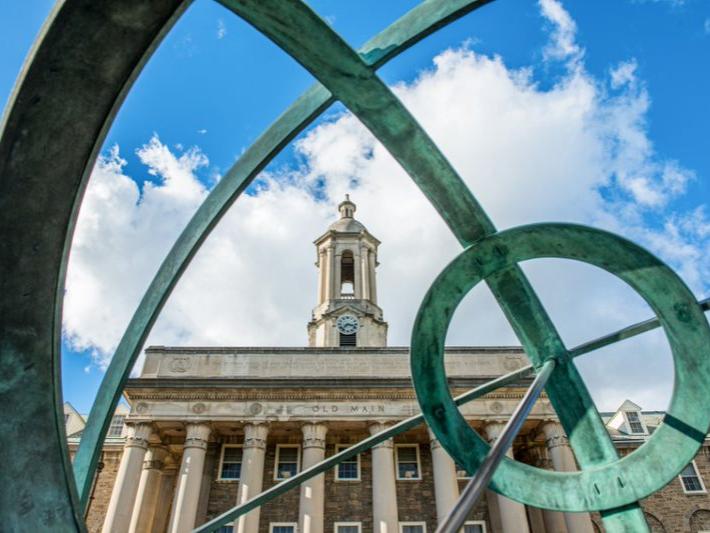 A photo of the Penn State University Park Old Main building on center campus.