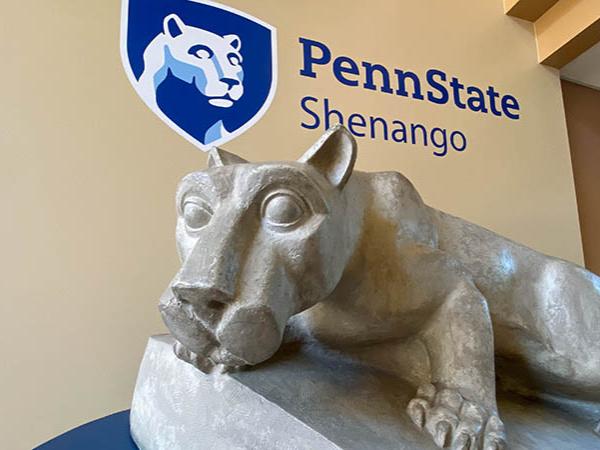 Lion Shrine statue under Penn State Shenango mark 