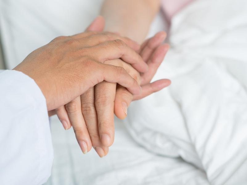 Nurse consoling patient