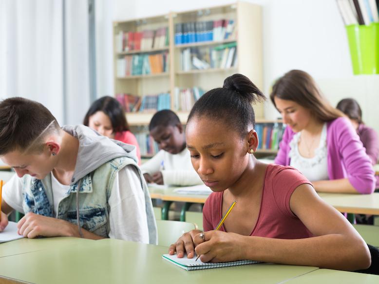 Students in school studying.