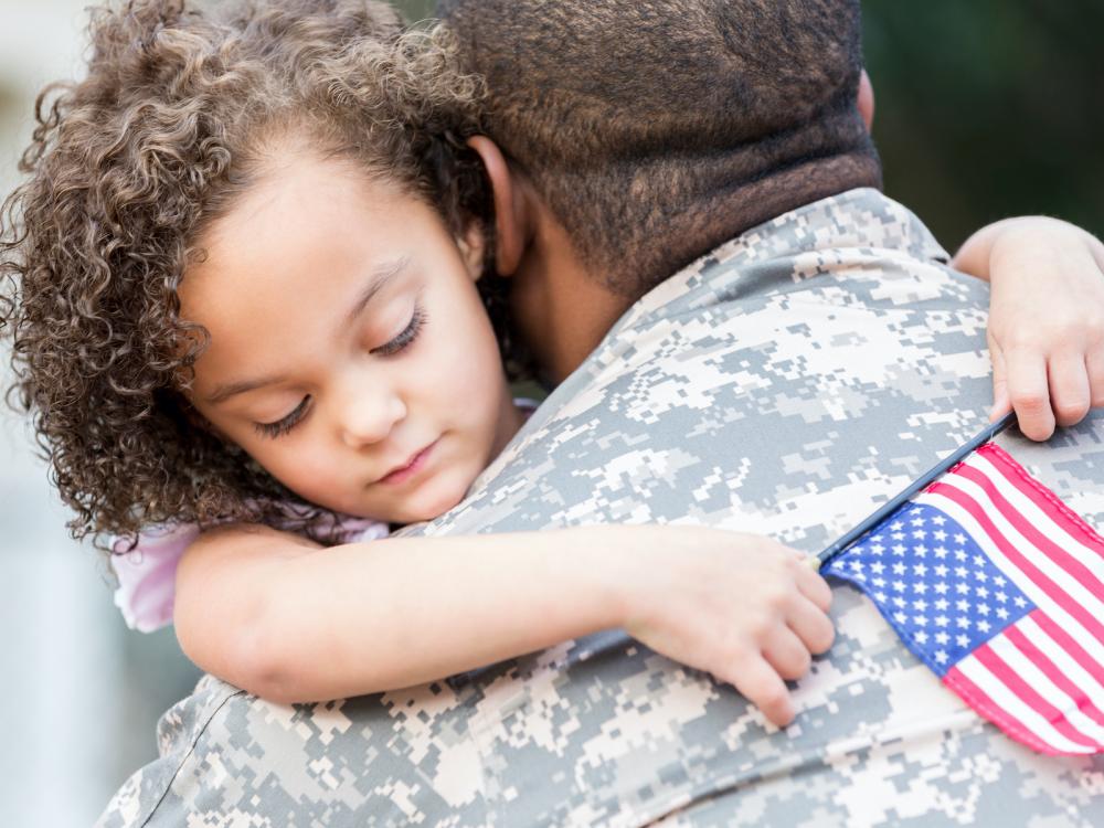 Soldier tells his little girl goodbye