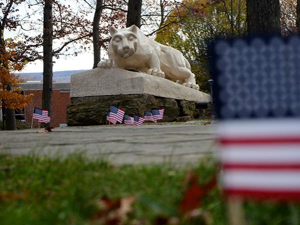 Penn State Altoona Lion Shrine with U.S. Flags